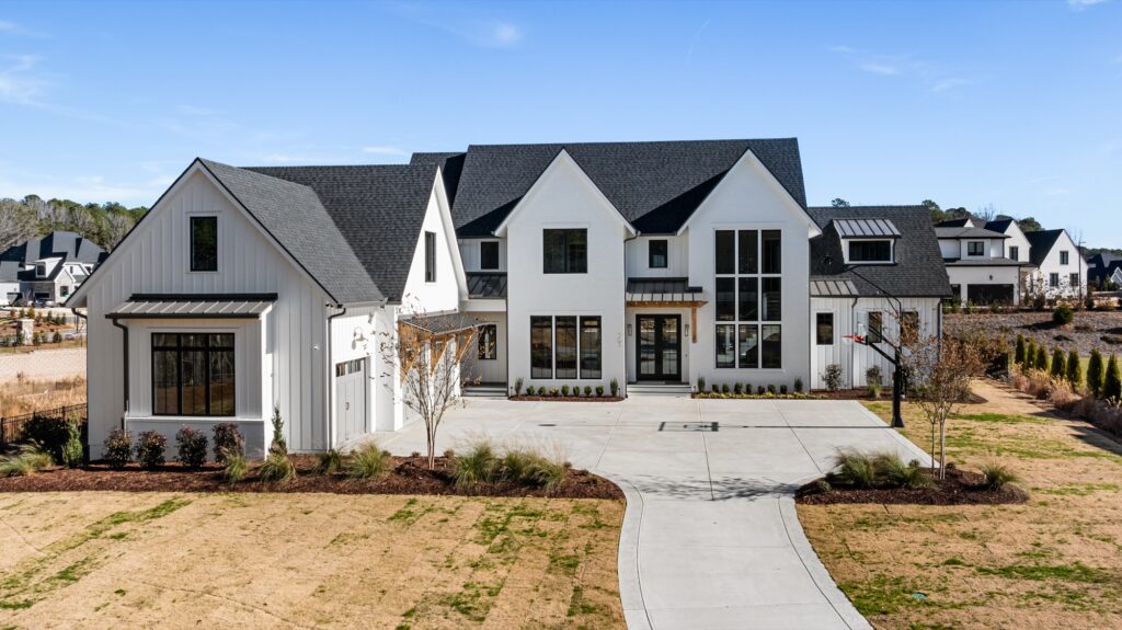 Front Elevation With Board and Batten Siding at Kingswell, a custom home built by Loyd Builders in Durham, NC