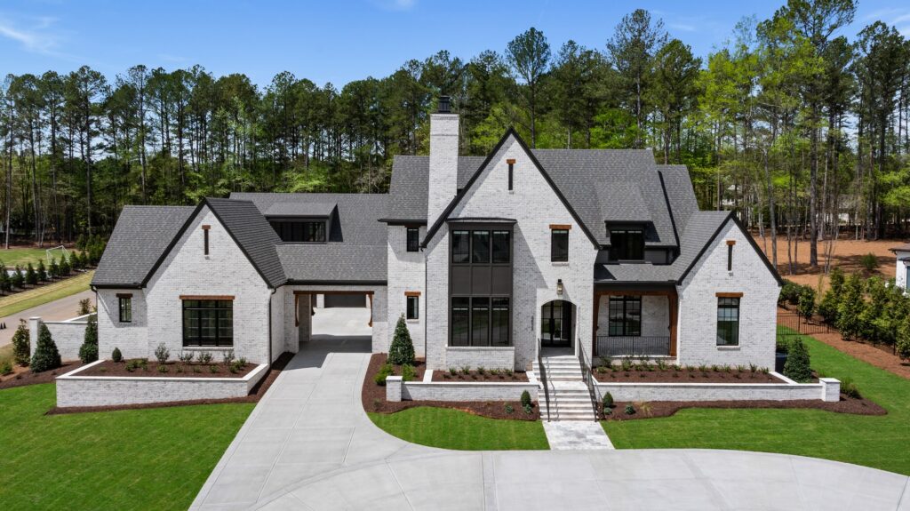 Front elevation in afternoon light at Everyday Elevated, a custom home built by Loyd Builders in Raleigh, NC