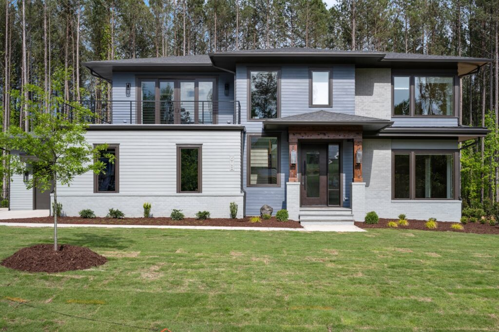 Front Elevation of Modern Prairie Home at Slate & Sky, a custom home built by Loyd Builders in Durham, NC